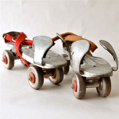 1960s skates in red metal box|vintage roller skates metal.